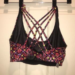 Geometric neon strappy back sports bra